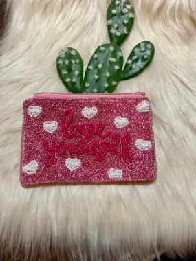 LOVE YOURSELF beaded clutch